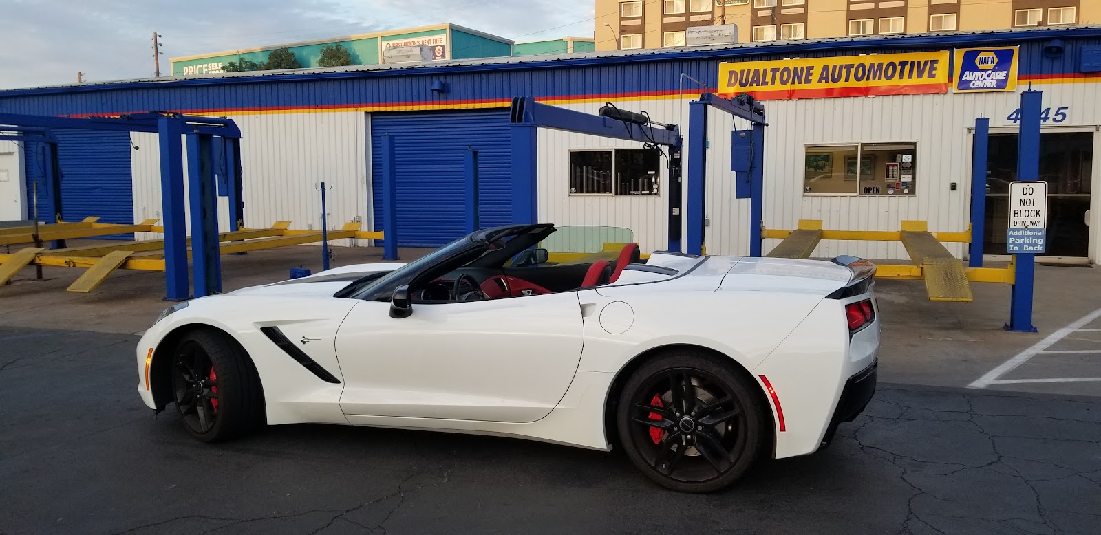 White Corvette in front of the Dualtone shop on Mission Bay Dr